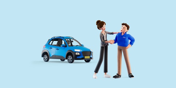 Man en vrouw naast blauwe auto