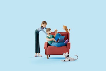Roos en Matthijs in een stoel met een kat