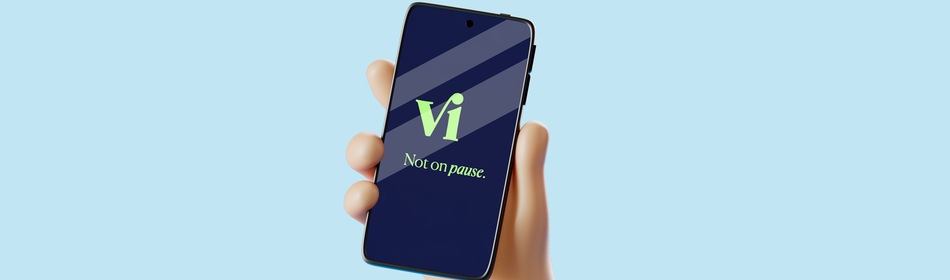 Hand met telefoon en Vi-app