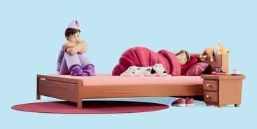 Vrouw ligt te slapen, man is wakker