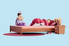 Vrouw ligt te slapen, man is wakker